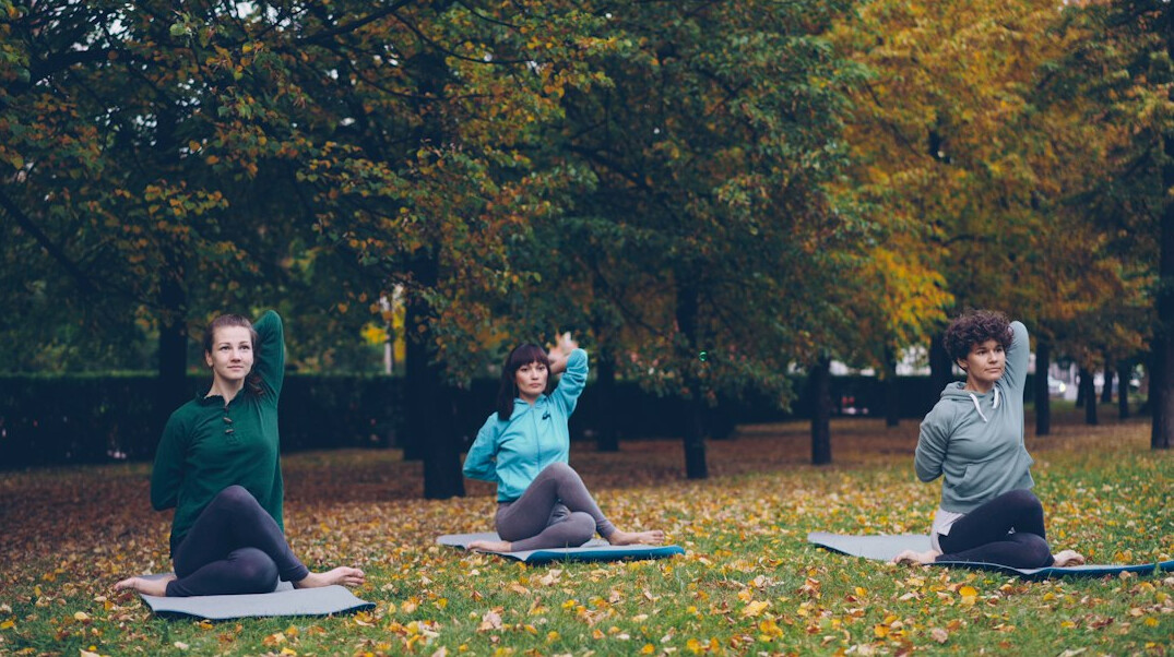 person meditating outdoors